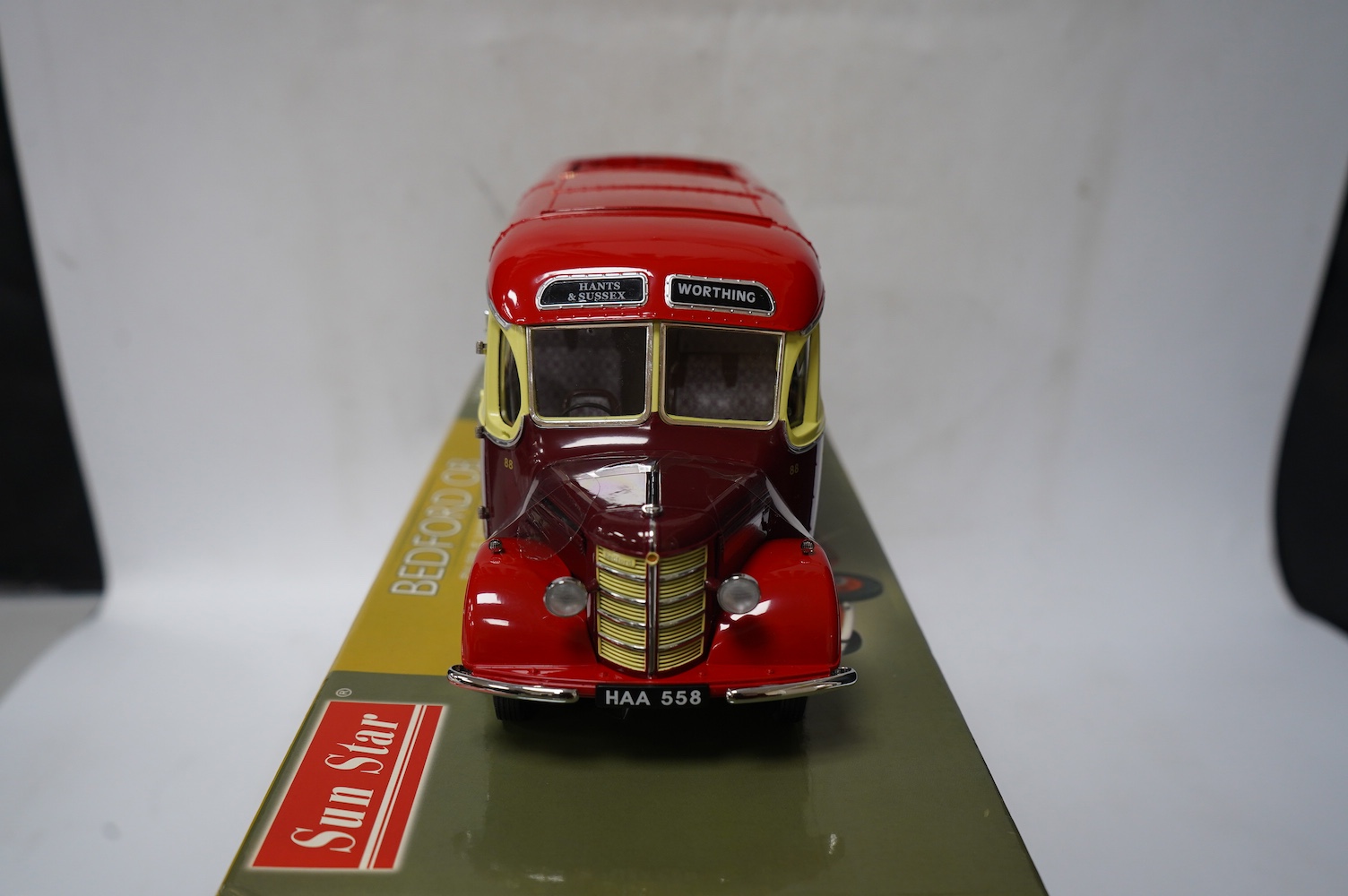 A boxed SunStar 1:24 scale Bedford OB Duple Vista coach, in Hants and Sussex delivery, with separate wing mirror and certificate. Condition - good, the model appears not to have been out on display.